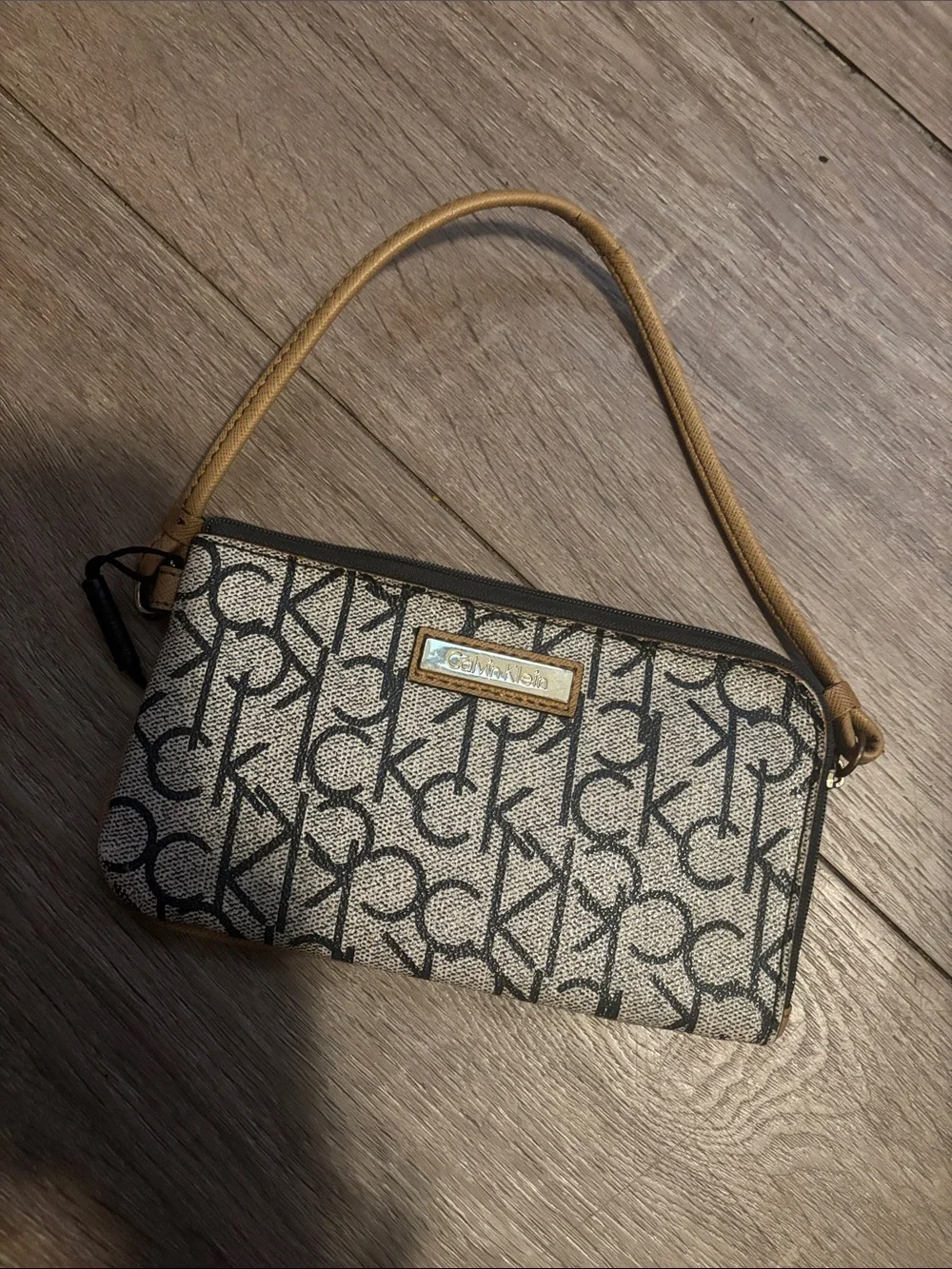 Calvin Klein Monogram Wristlet in Black and Tan